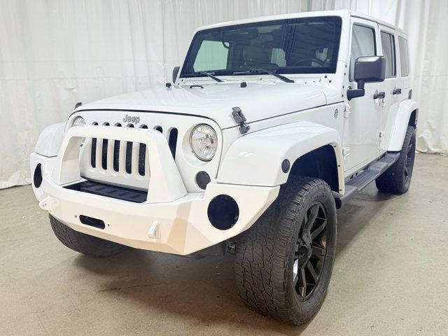 used 2011 Jeep Wrangler Unlimited car, priced at $14,988