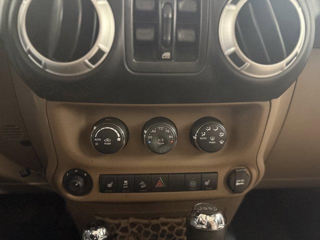 used 2011 Jeep Wrangler Unlimited car, priced at $14,988