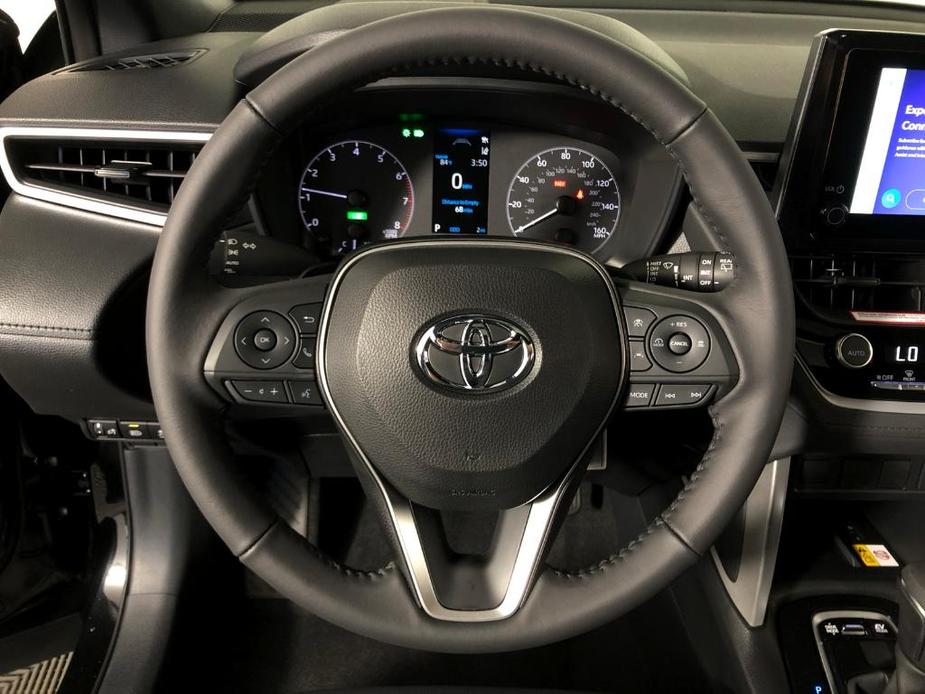 used 2024 Toyota Corolla Cross Hybrid car, priced at $31,179