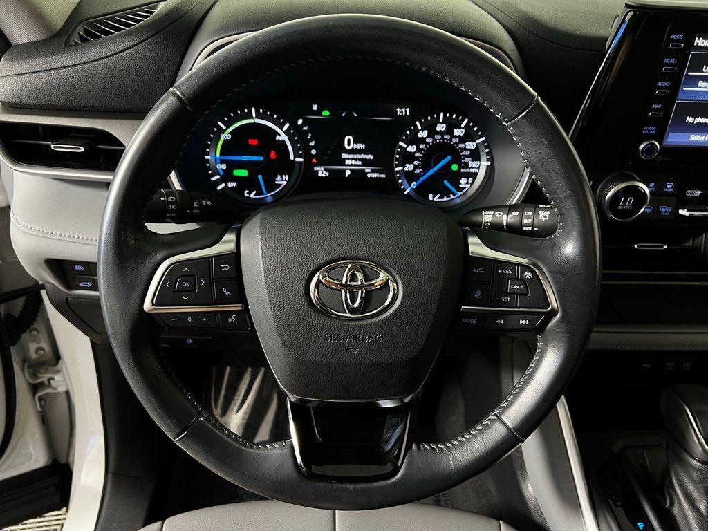 used 2021 Toyota Highlander Hybrid car, priced at $32,169