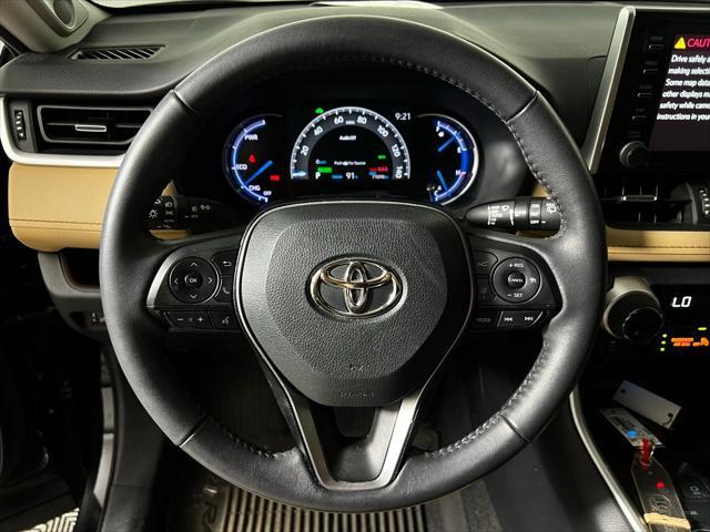 used 2021 Toyota RAV4 Hybrid car, priced at $31,457