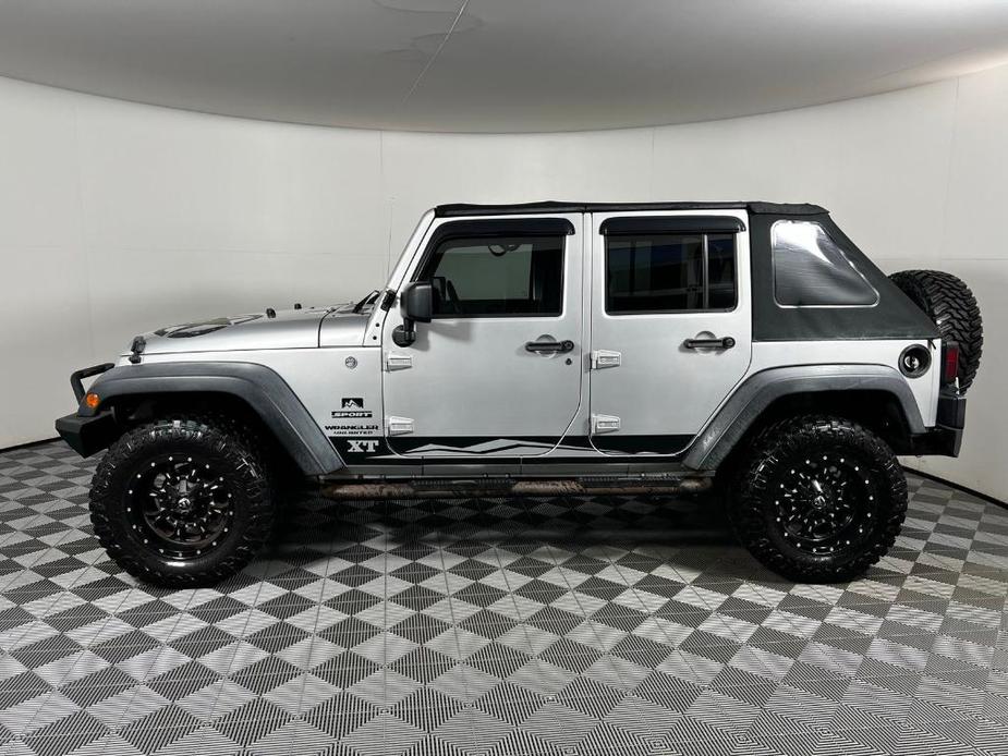 used 2012 Jeep Wrangler Unlimited car, priced at $17,380