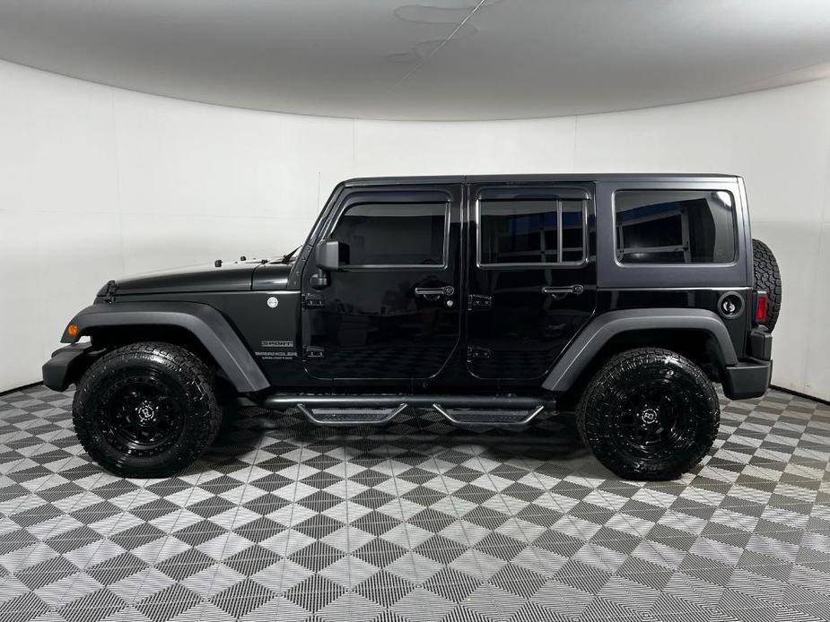 used 2016 Jeep Wrangler Unlimited car, priced at $22,514