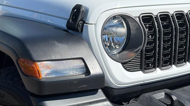 used 2024 Jeep Wrangler car, priced at $33,495