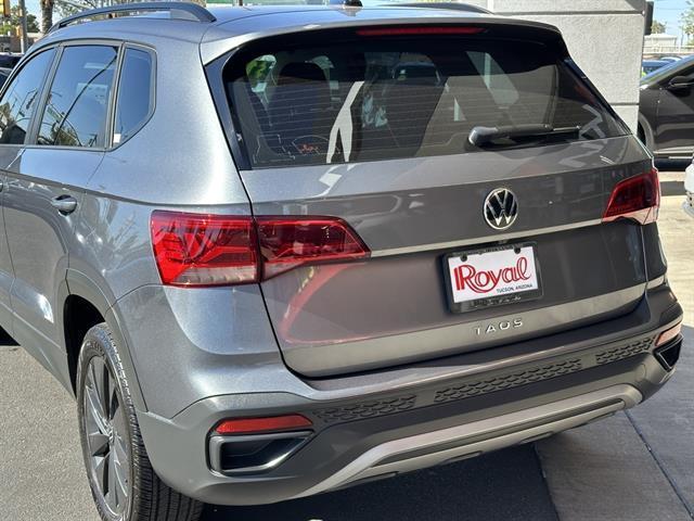 used 2023 Volkswagen Taos car, priced at $19,670