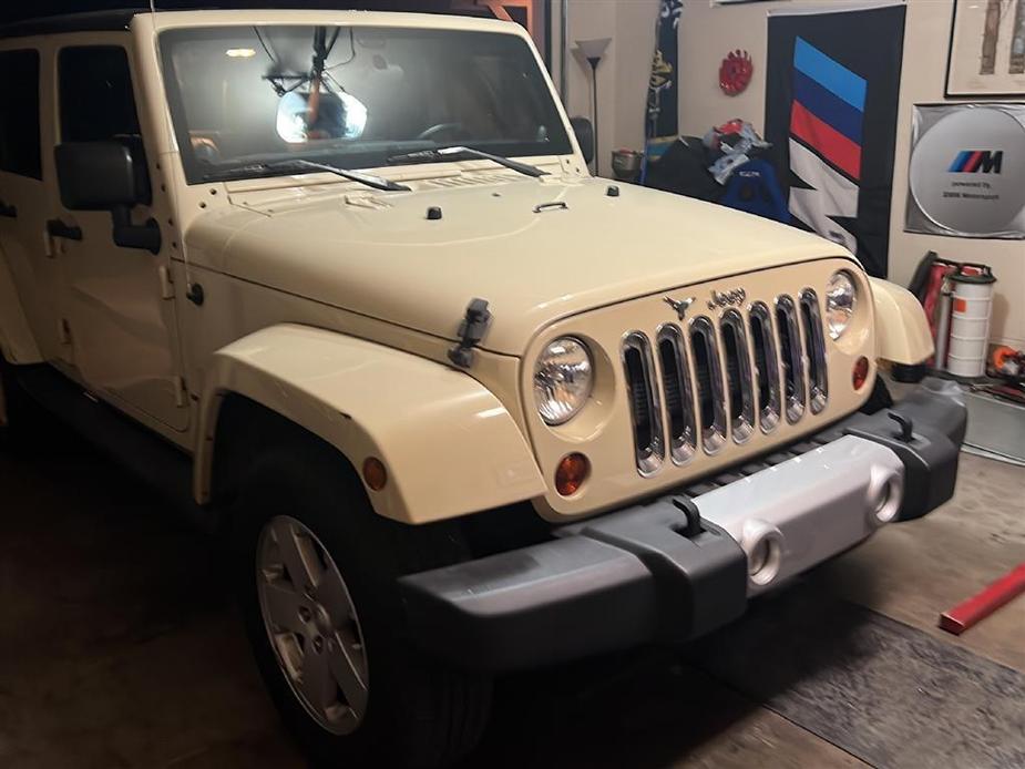 used 2012 Jeep Wrangler Unlimited car, priced at $18,990