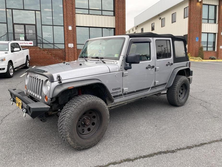 used 2013 Jeep Wrangler Unlimited car, priced at $15,985