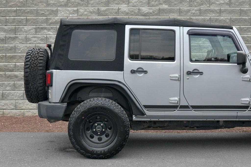 used 2013 Jeep Wrangler Unlimited car, priced at $15,325