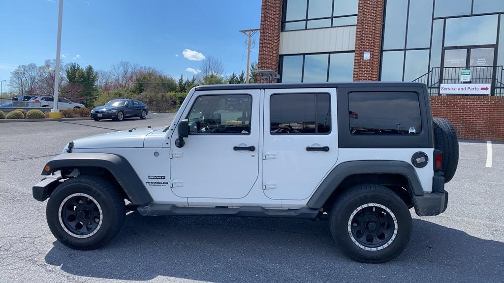 used 2012 Jeep Wrangler Unlimited car, priced at $15,856