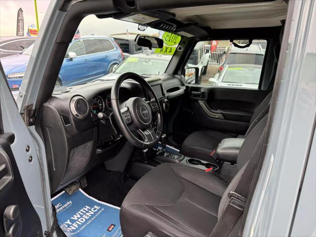 used 2015 Jeep Wrangler Unlimited car, priced at $16,999