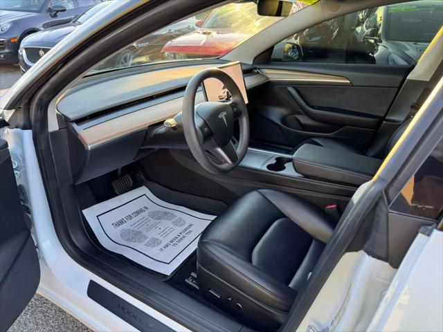 used 2023 Tesla Model 3 car, priced at $26,499