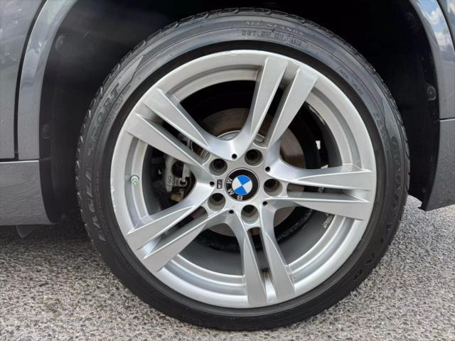 used 2014 BMW X1 car, priced at $8,999