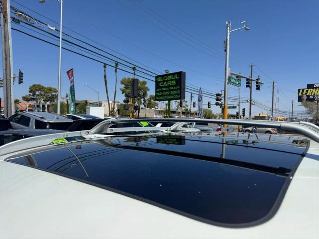 used 2015 Nissan Rogue car, priced at $9,999