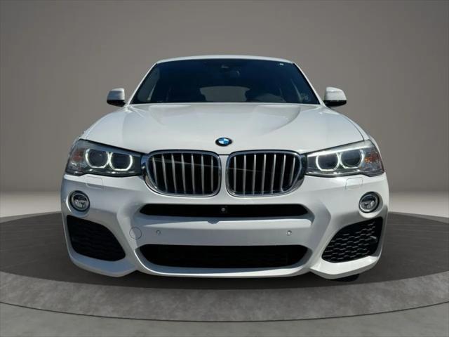 used 2016 BMW X4 car, priced at $15,499