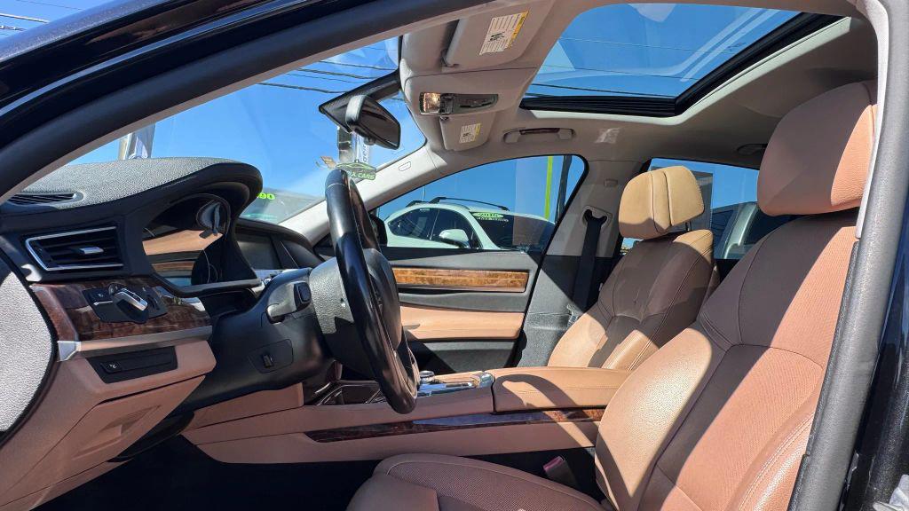 used 2014 BMW 740 car, priced at $11,999