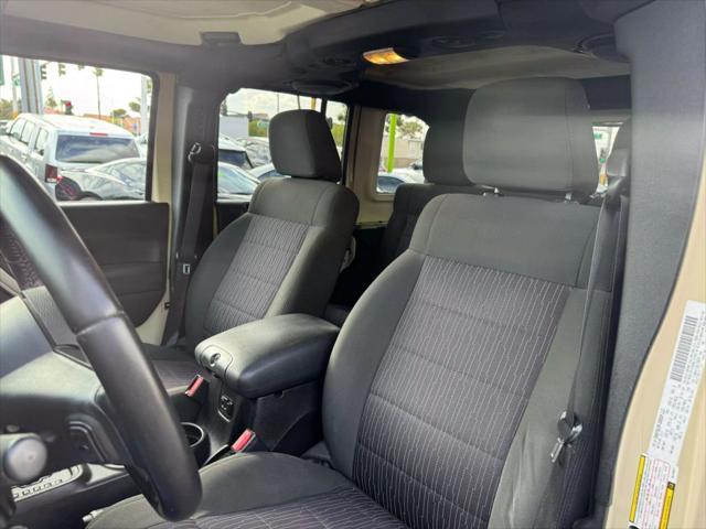 used 2011 Jeep Wrangler Unlimited car, priced at $15,499