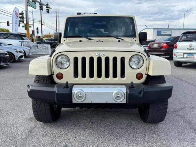 used 2011 Jeep Wrangler Unlimited car, priced at $15,499