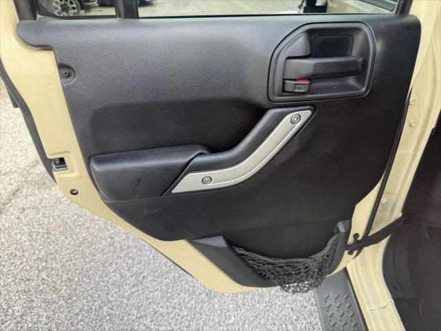 used 2011 Jeep Wrangler Unlimited car, priced at $15,499