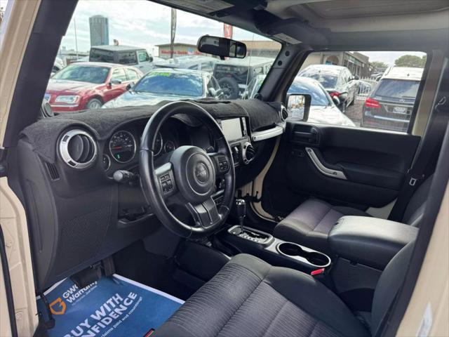 used 2011 Jeep Wrangler Unlimited car, priced at $15,499