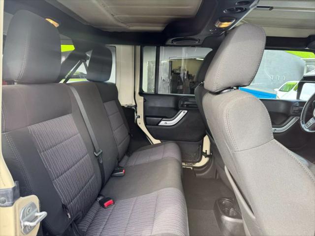 used 2011 Jeep Wrangler Unlimited car, priced at $15,499