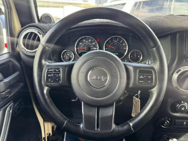 used 2011 Jeep Wrangler Unlimited car, priced at $15,499