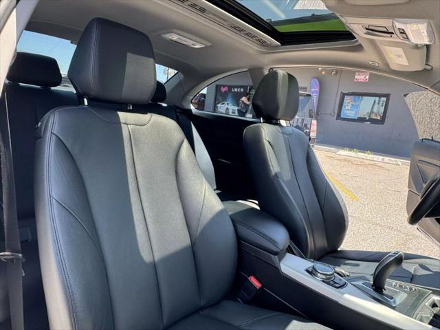 used 2014 BMW 228 car, priced at $12,999
