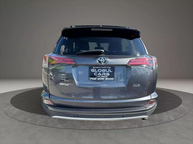 used 2018 Toyota RAV4 car, priced at $20,999
