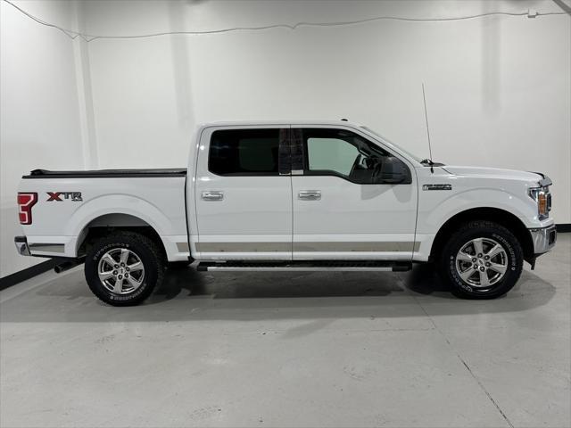 used 2018 Ford F-150 car, priced at $29,465