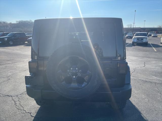 used 2018 Jeep Wrangler JK Unlimited car, priced at $26,311