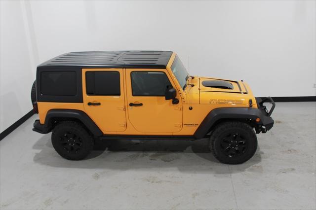 used 2013 Jeep Wrangler Unlimited car, priced at $20,970