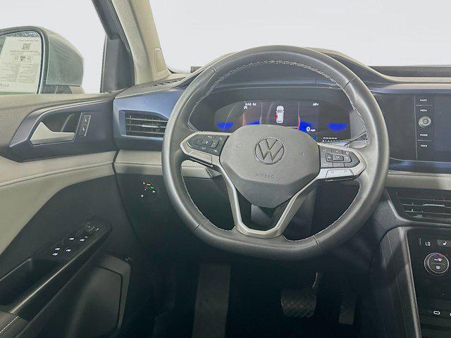 used 2024 Volkswagen Taos car, priced at $21,597