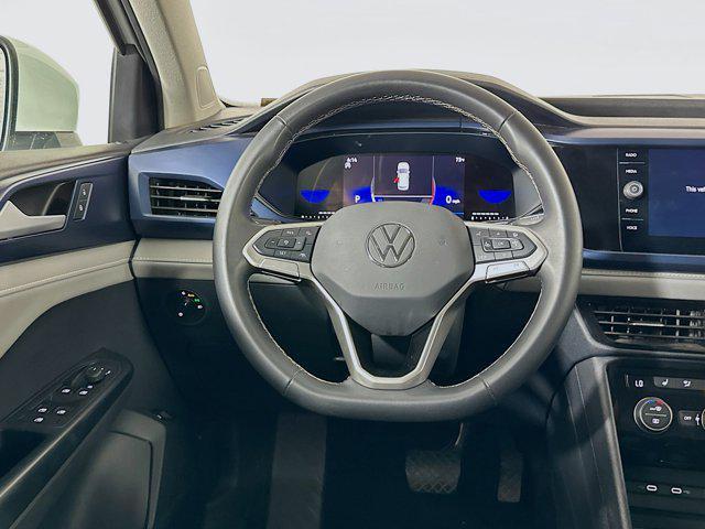 used 2024 Volkswagen Taos car, priced at $20,197