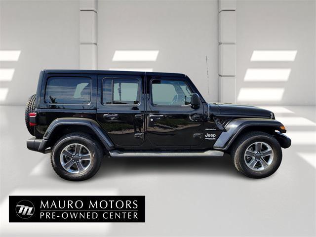 used 2021 Jeep Wrangler Unlimited car, priced at $33,594