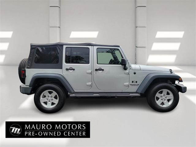 used 2009 Jeep Wrangler Unlimited car, priced at $11,999