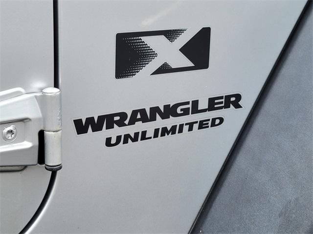 used 2009 Jeep Wrangler Unlimited car, priced at $11,999