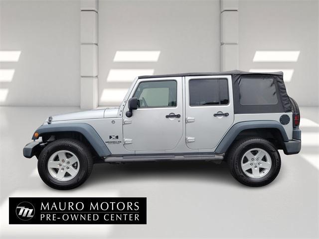 used 2009 Jeep Wrangler Unlimited car, priced at $11,999