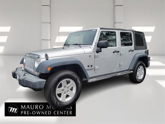 used 2009 Jeep Wrangler Unlimited car, priced at $11,999