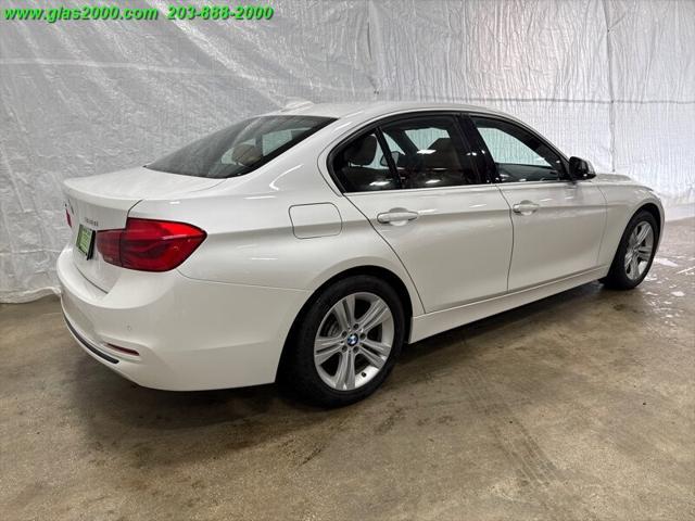 used 2018 BMW 330 car, priced at $19,999