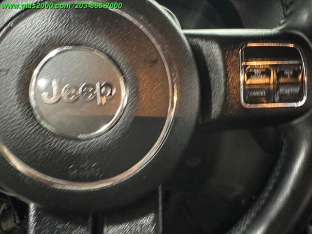 used 2014 Jeep Wrangler car, priced at $15,999