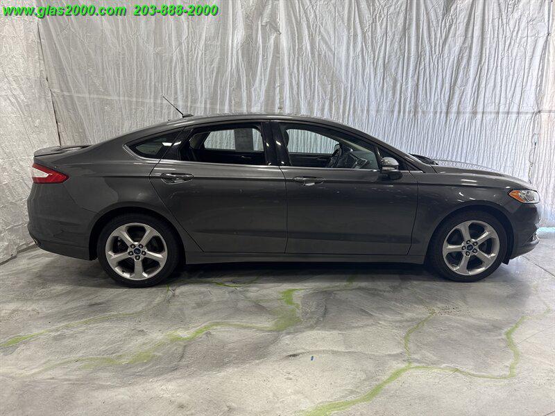 used 2016 Ford Fusion car, priced at $7,999