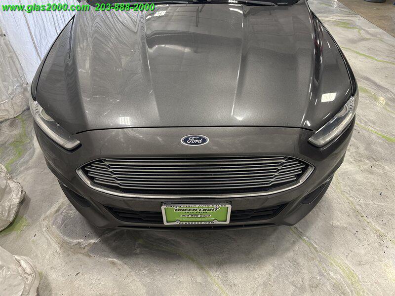 used 2016 Ford Fusion car, priced at $7,999