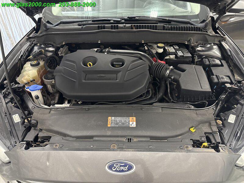 used 2016 Ford Fusion car, priced at $7,999