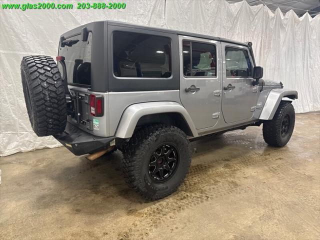 used 2013 Jeep Wrangler Unlimited car, priced at $14,999