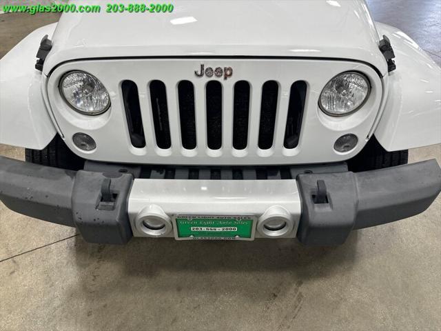 used 2014 Jeep Wrangler Unlimited car, priced at $17,999