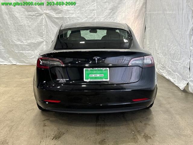 used 2020 Tesla Model 3 car, priced at $18,999