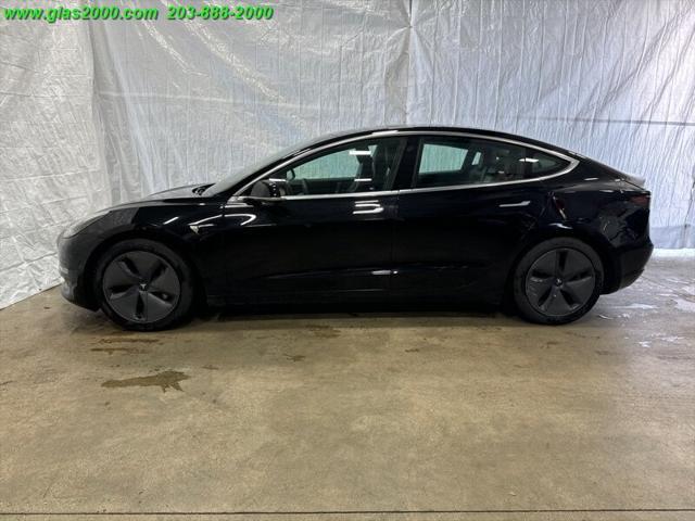 used 2020 Tesla Model 3 car, priced at $18,999