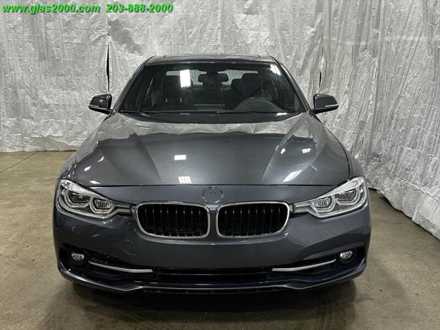 used 2018 BMW 330 car, priced at $19,999