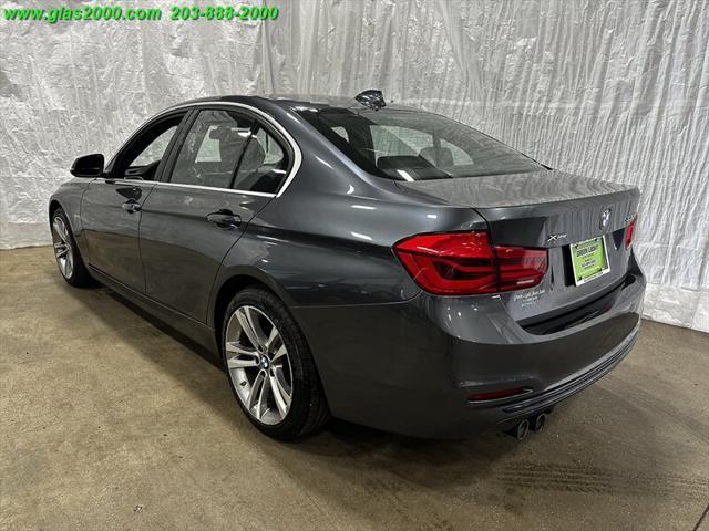 used 2018 BMW 330 car, priced at $19,999