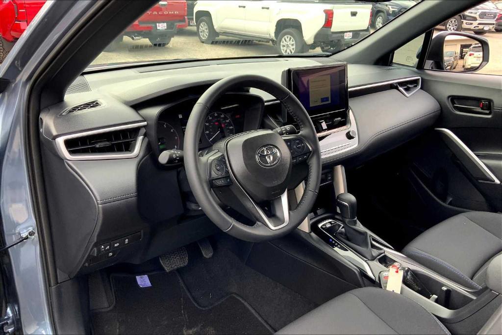 used 2024 Toyota Corolla Cross Hybrid car, priced at $32,994