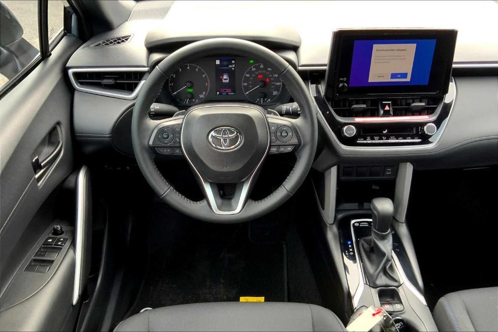 used 2024 Toyota Corolla Cross Hybrid car, priced at $32,994